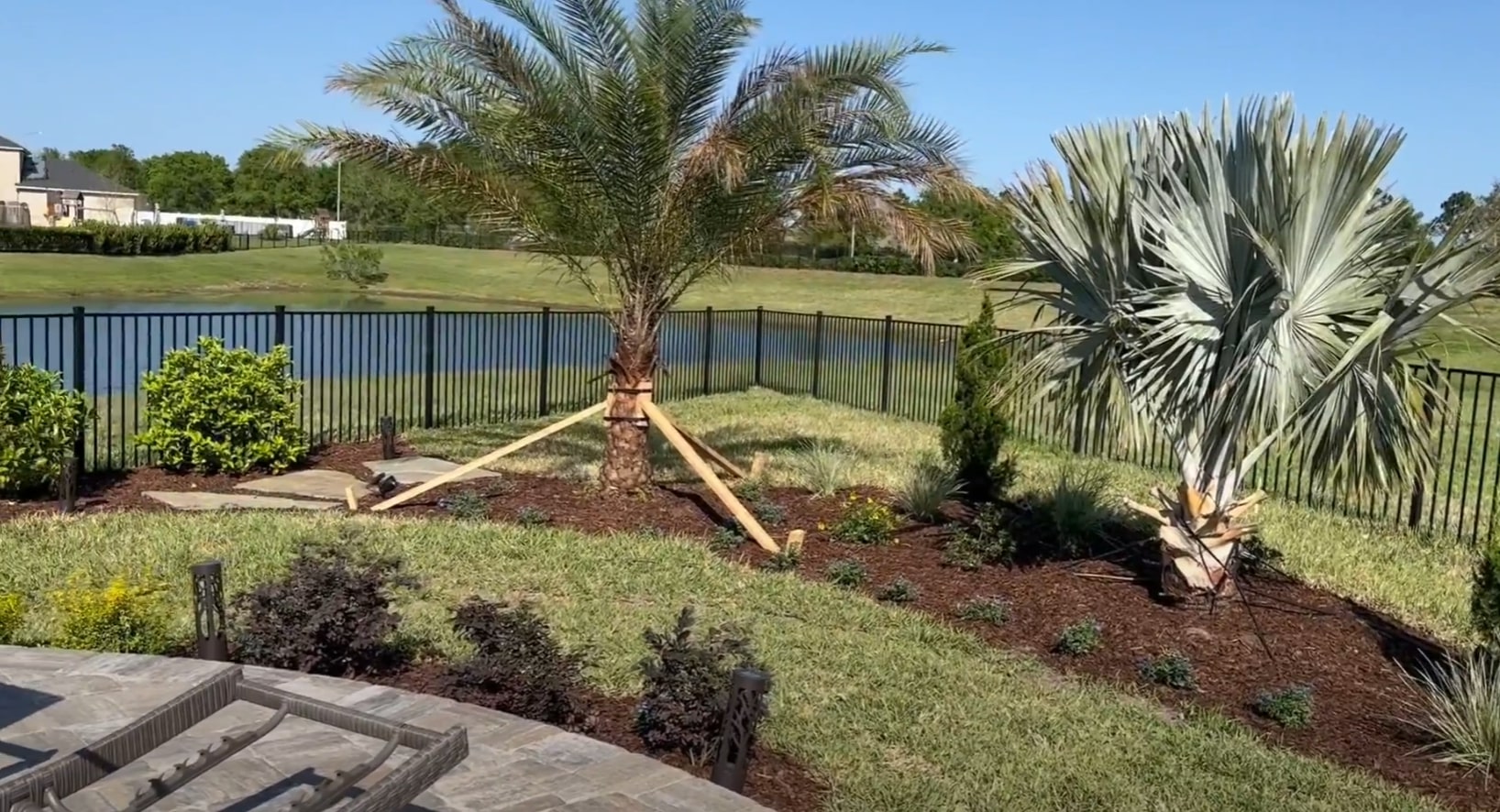 Professional Landscaping Team at Work in Dunwoody, GA Dunwoody Landscapers team working on professional landscaping project with beautiful results