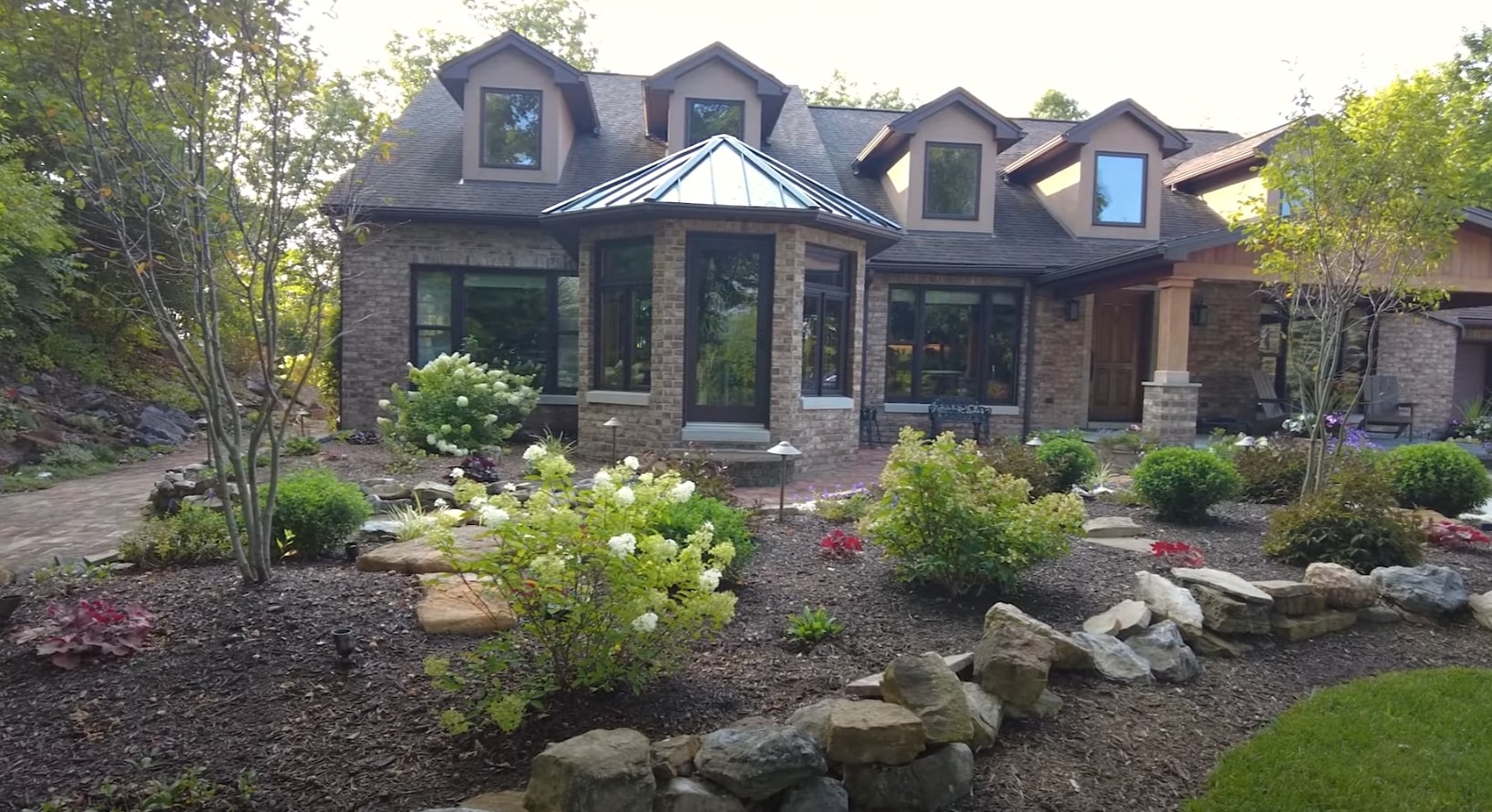 Professional Landscape Design and Maintenance Services Beautiful residential landscape with professional design and maintenance in Dunwoody, GA