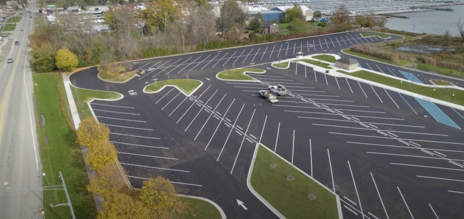 Commercial Landscaping and Sod Installation Services Aerial view of commercial landscaping project with professional sod installation and landscape maintenance for large parking area