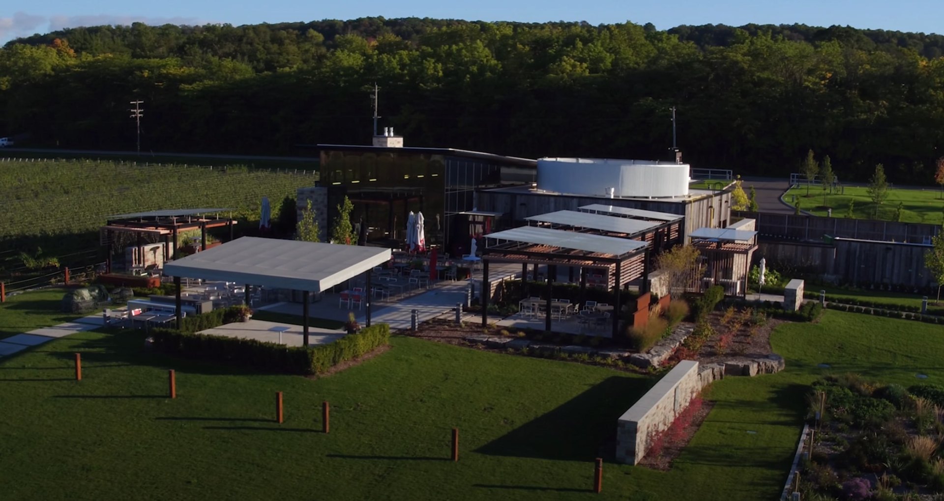 Commercial Landscape Architecture and Hardscaping Aerial view of modern commercial landscape architecture with professional hardscaping, outdoor structures, and comprehensive landscaping services